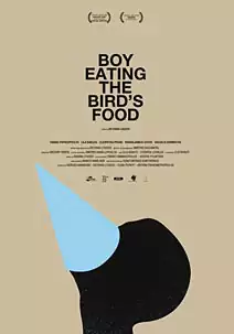 Boy eating the bird